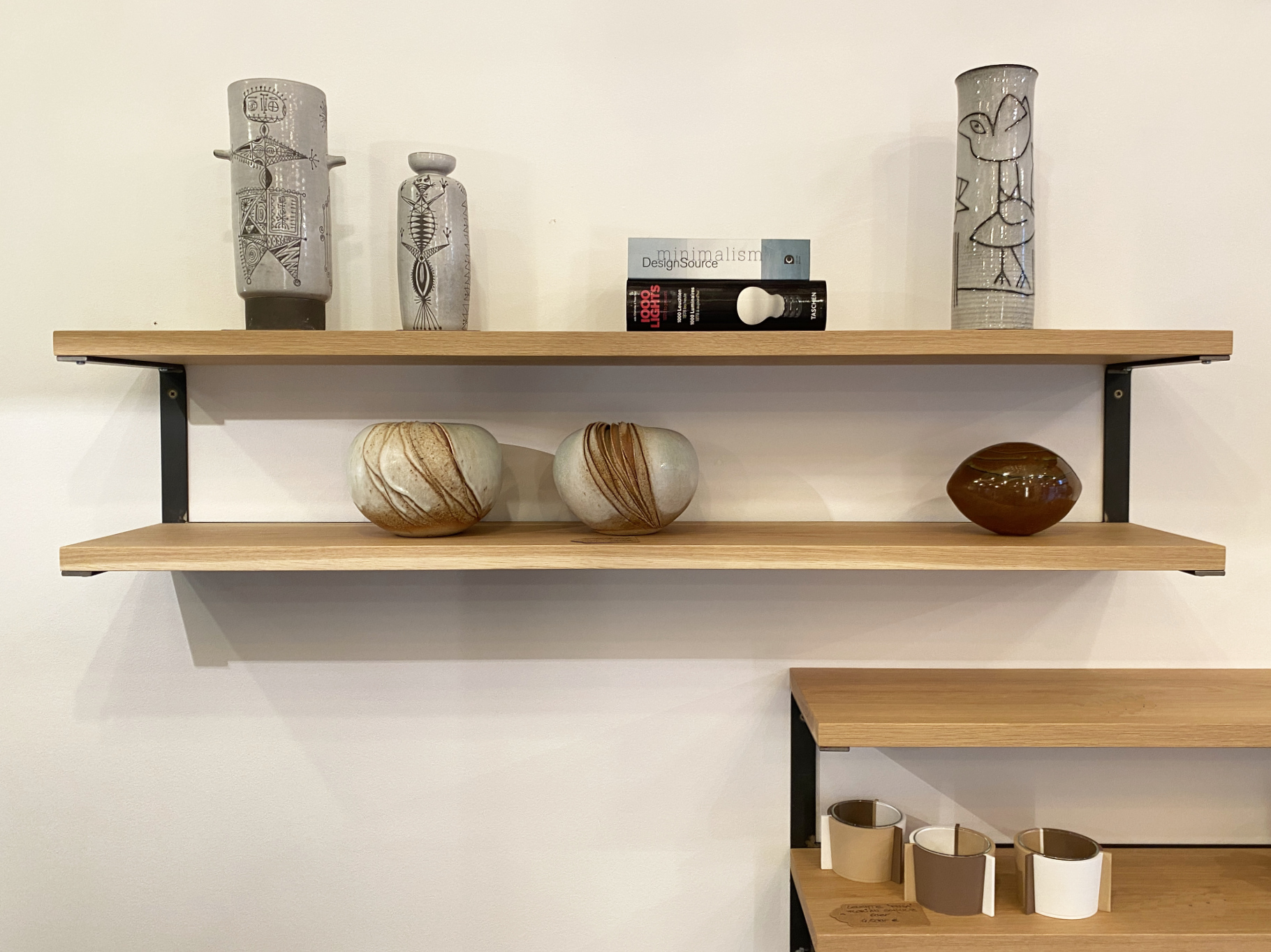 Bookshelf / Wall shelf designed by Inga Reichert, made of black untreated crude steel and Oak Wood - Industrial Design